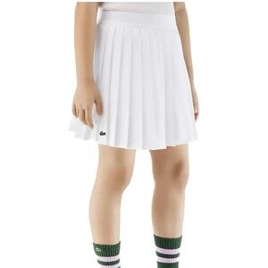 Girl’s Lacoste pleated poly tennis skort. Size 12A/L NWT